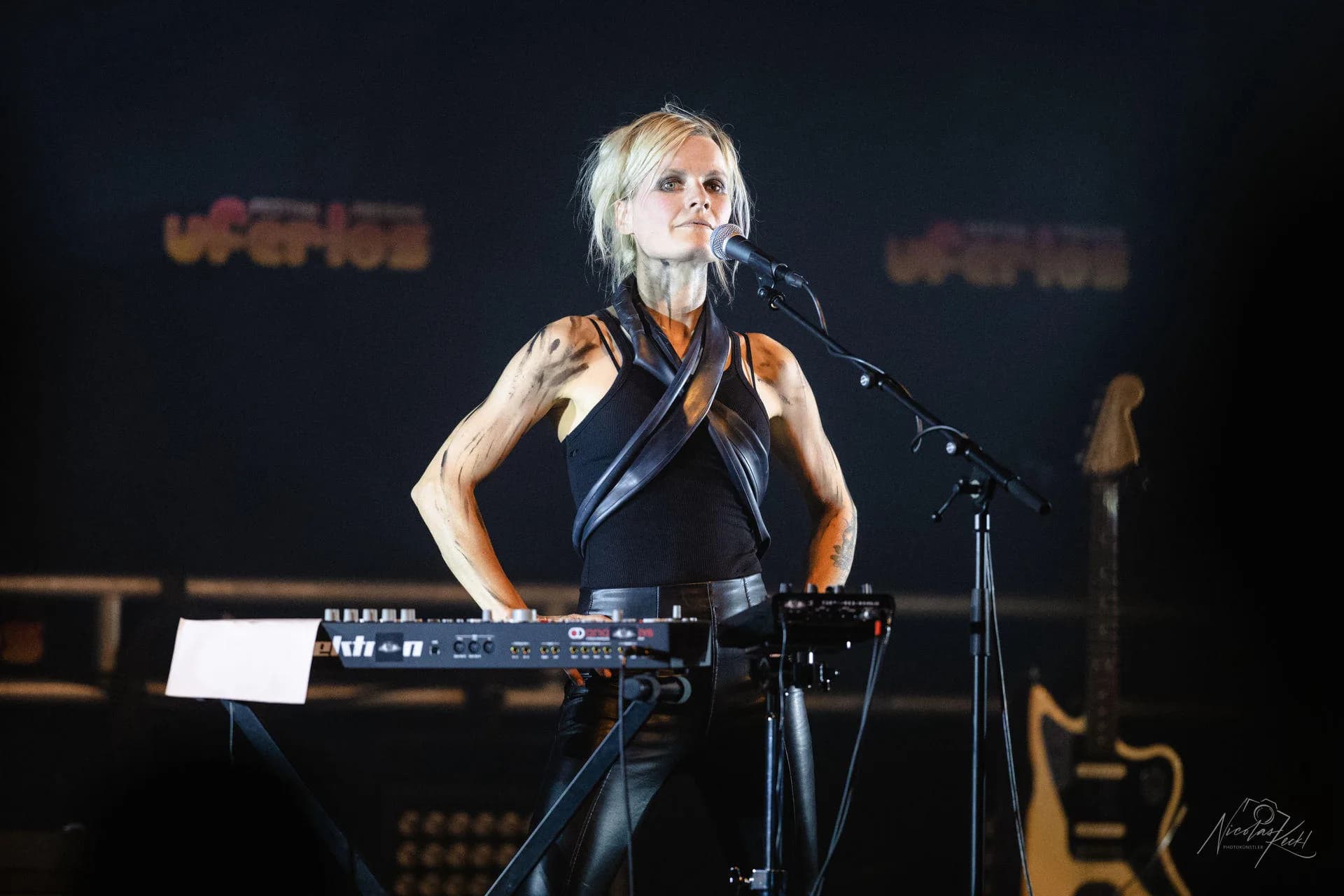 Female Performer Keyboard Dark Stage