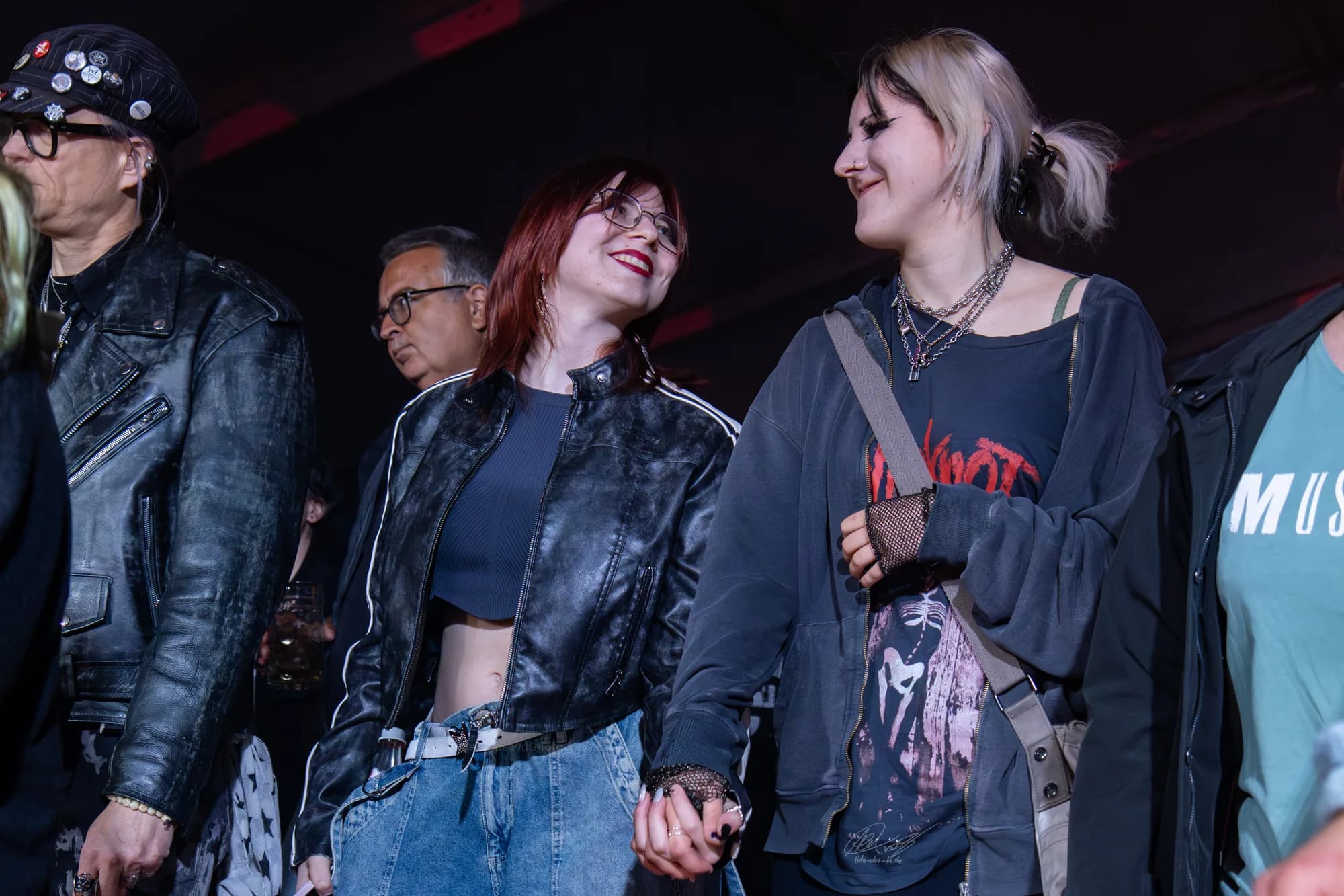 Festival-goers sharing a relaxed, joyful moment together at the grounds.